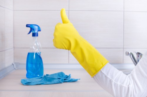 Carpet cleaning team discussing a service issue
